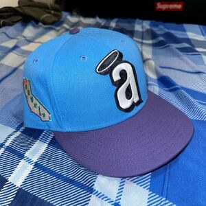 New Era Blue and Purple Hat new without tags size 8